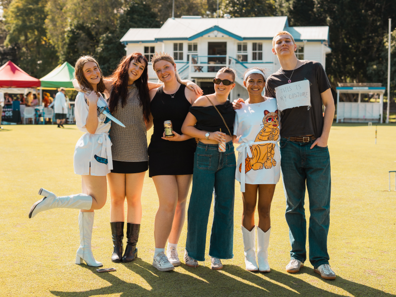 Students playing croquet